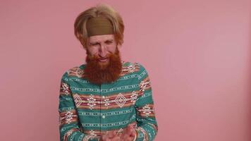 Upset disappointed bearded man wipes tears, cries from despair, being sad because of unfair things video