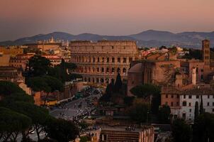 Sunset View of the Colosseum and Roman Skyline panaramic view from Vittoriano photo