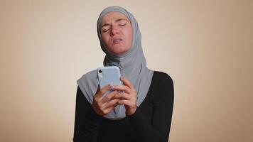 Woman use smartphone typing browsing, loses becoming surprised sudden lottery results, bad fortune video