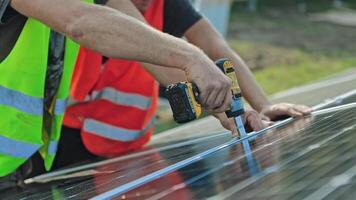 Working on repair solar panel. Technician working on installation of solar panel video
