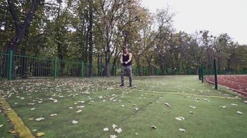 Sportsman doing exercise. Fit athlete doing exercises at stadium video