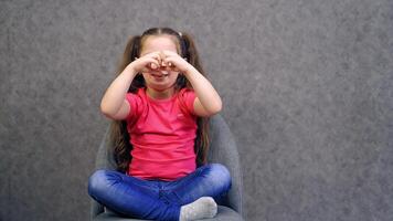 Portrait of happy child girl. Happy smiling child girl isolated on gray background video