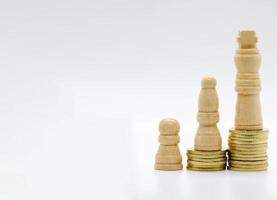Pawns on golden coins representing status with customizable space for text photo
