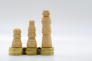 Pawns on golden coins representing status with customizable space for text. photo