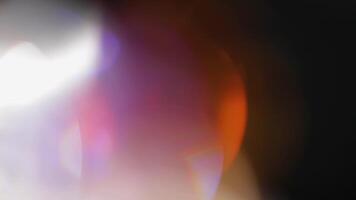 Multicolored light leaks 4k footage on black background, Stylizing , transitions, Bokeh effect video