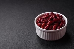Delicious nutritious canned red beans, with salt and spices photo