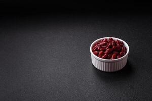 Delicious nutritious canned red beans, with salt and spices photo