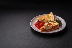 Delicious quiche with broccoli, cheese, chicken, spices and herbs photo