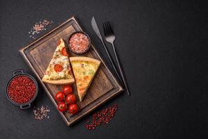 Delicious quiche with broccoli, cheese, chicken, spices and herbs photo