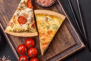 Delicious quiche with broccoli, cheese, chicken, spices and herbs photo