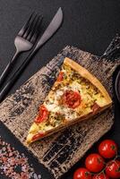 Delicious crispy quiche cut into slices with cheese, broccoli, tomatoes photo