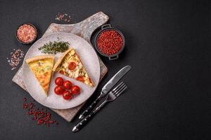 Delicious quiche with broccoli, cheese, chicken, spices and herbs photo