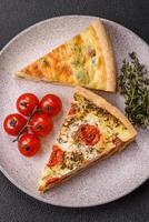 Delicious quiche with broccoli, cheese, chicken, spices and herbs photo