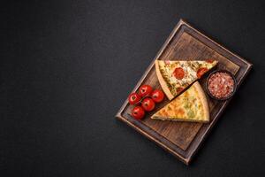 Delicious quiche with broccoli, cheese, chicken, spices and herbs photo