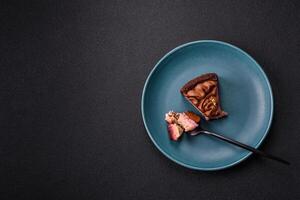 A piece of sweet cheesecake with mascarpone cheese, strawberry flavor photo
