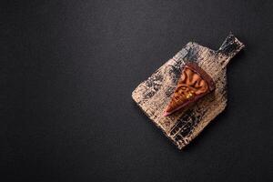 A piece of sweet cheesecake with mascarpone cheese, strawberry flavor photo