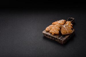 Delicious sweet gingerbread, madeleine biscuits and other elements of Christmas decorations photo