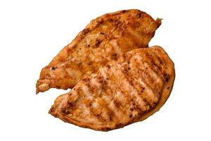 Grilled chicken fillet with salt, spices and herbs photo