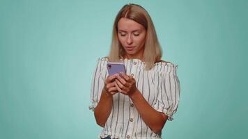 Woman using smartphone typing new post on web, sms message, browsing, addiction of social networks video