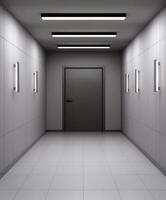 Modern corridor with bright lighting and a closed door at the end photo