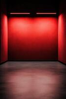 Empty room with red walls and dim lighting creates a dramatic atmosphere photo