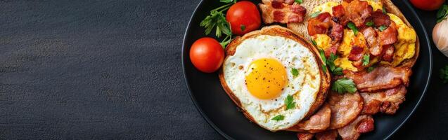 Delicious breakfast platter with eggs, bacon, and tomatoes served hot photo