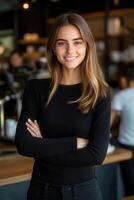 Confident young woman smiling in a modern cafe setting photo