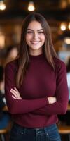 Smiling woman with long hair in a cozy indoor setting photo
