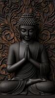 Intricate black Buddha statue with decorative background photo