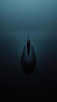 Submarine navigating through dark ocean waters at dusk photo