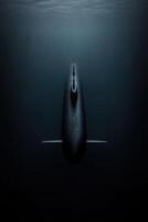 Submarine navigating deep beneath the ocean surface photo