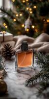 Elegant perfume bottle displayed among holiday decorations photo