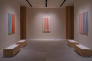 Modern art gallery with abstract paintings on display photo