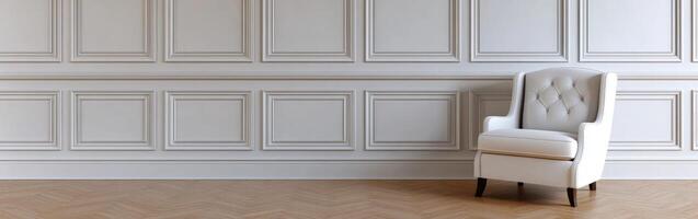 Simple white armchair against a textured wall in a quiet room photo