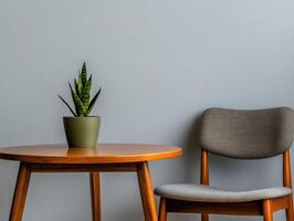 Cozy corner featuring a chair and a plant on a wooden table photo