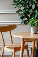 Beautiful indoor plant decor beside wooden chair and table photo