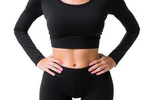 Fitness enthusiast showcasing abs in black workout attire photo