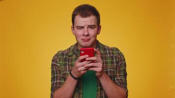 Man use smartphone typing browsing, loses becoming surprised sudden lottery results, bad fortune video