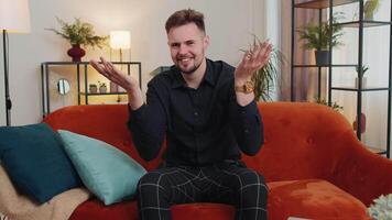 Young bearded man asking why, what reason of failure, demonstrating disbelief irritation by troubles video