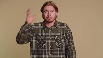 Confused man feeling embarrassed about ambiguous question, having doubts, no idea clueless uncertain video