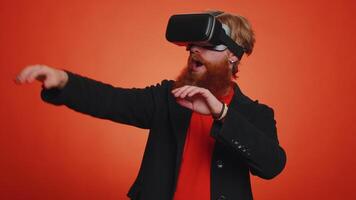 Man using virtual reality headset helmet app to play simulation innovation 3D game in VR goggles video