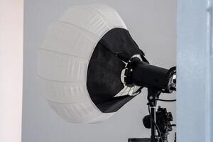 A beautiful lighting lantern placed in a photography studio, casting soft light and creating a warm and inviting atmosphere for creative photo shoots and studio sessions