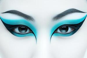 Artistic Blue and Black Eyeliner with Flawless Symmetry photo