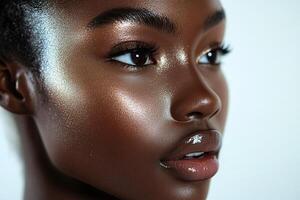 Close-Up of Glossy Makeup Look Featuring Golden-Bronze Highlighter and Natural Shine photo