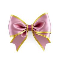 A pink bow with gold trim on a white background photo
