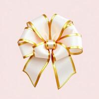 White and gold bow on a pink background photo