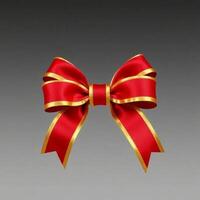 Red bow with gold ribbon on gray background photo