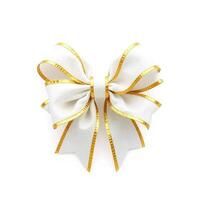A white and gold bow with a ribbon on top photo