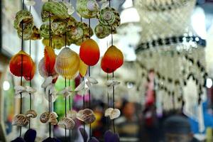Handmade souvenir decorated with different sea shells photo