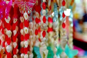 Handmade souvenir decorated with different sea shells photo